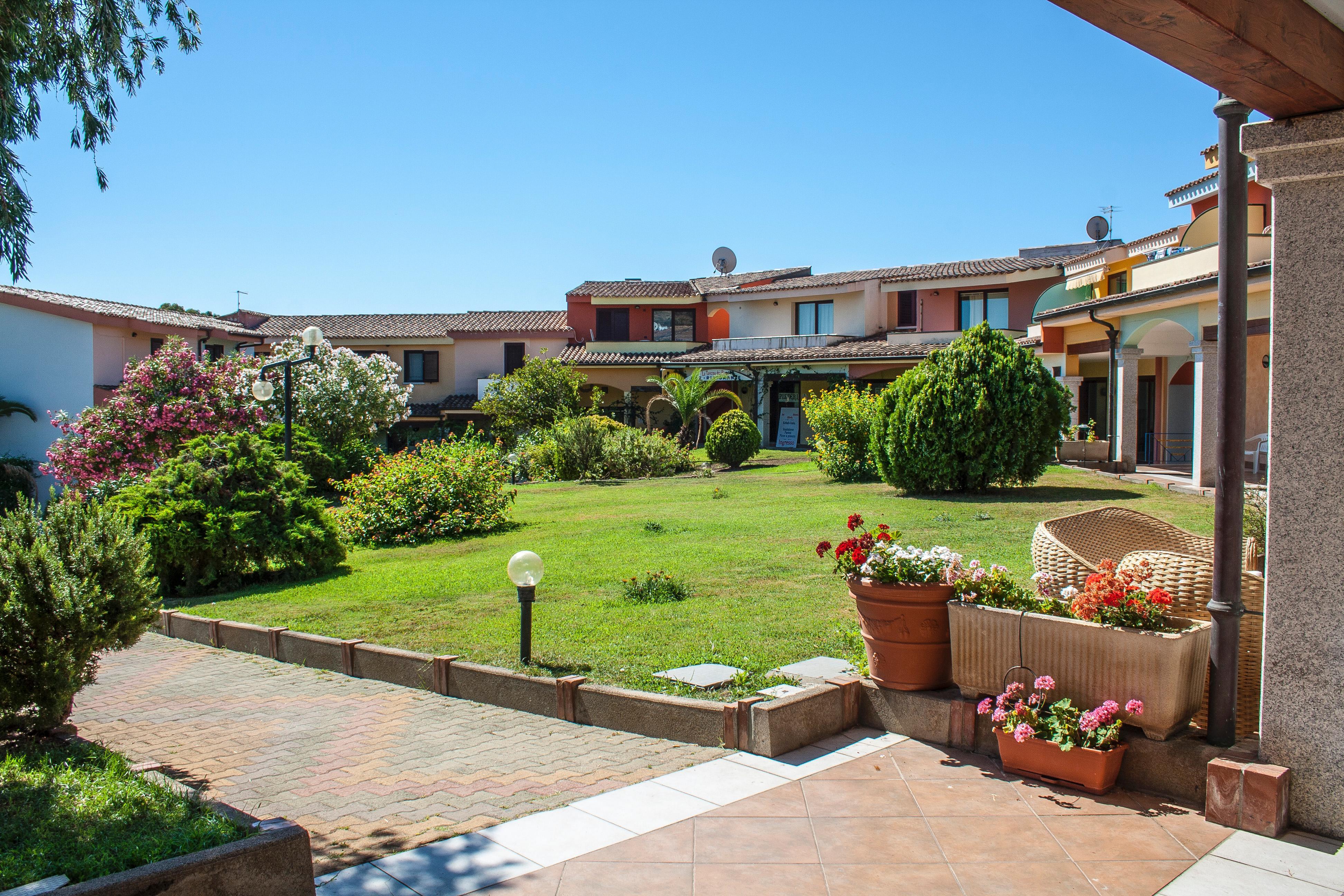 Residence Oasi Anfiteatro Porto Ottiolu Exterior foto