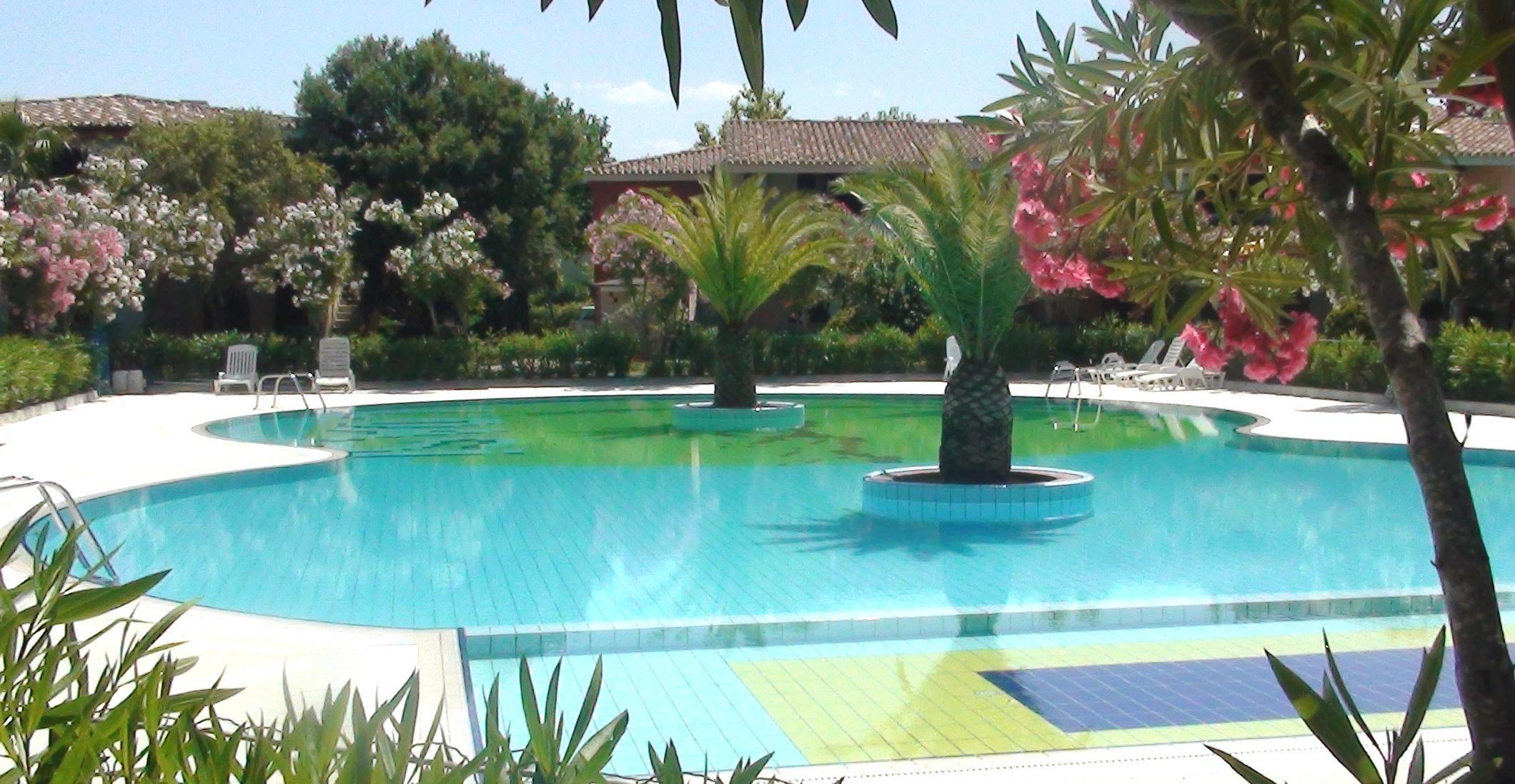 Residence Oasi Anfiteatro Porto Ottiolu Exterior foto