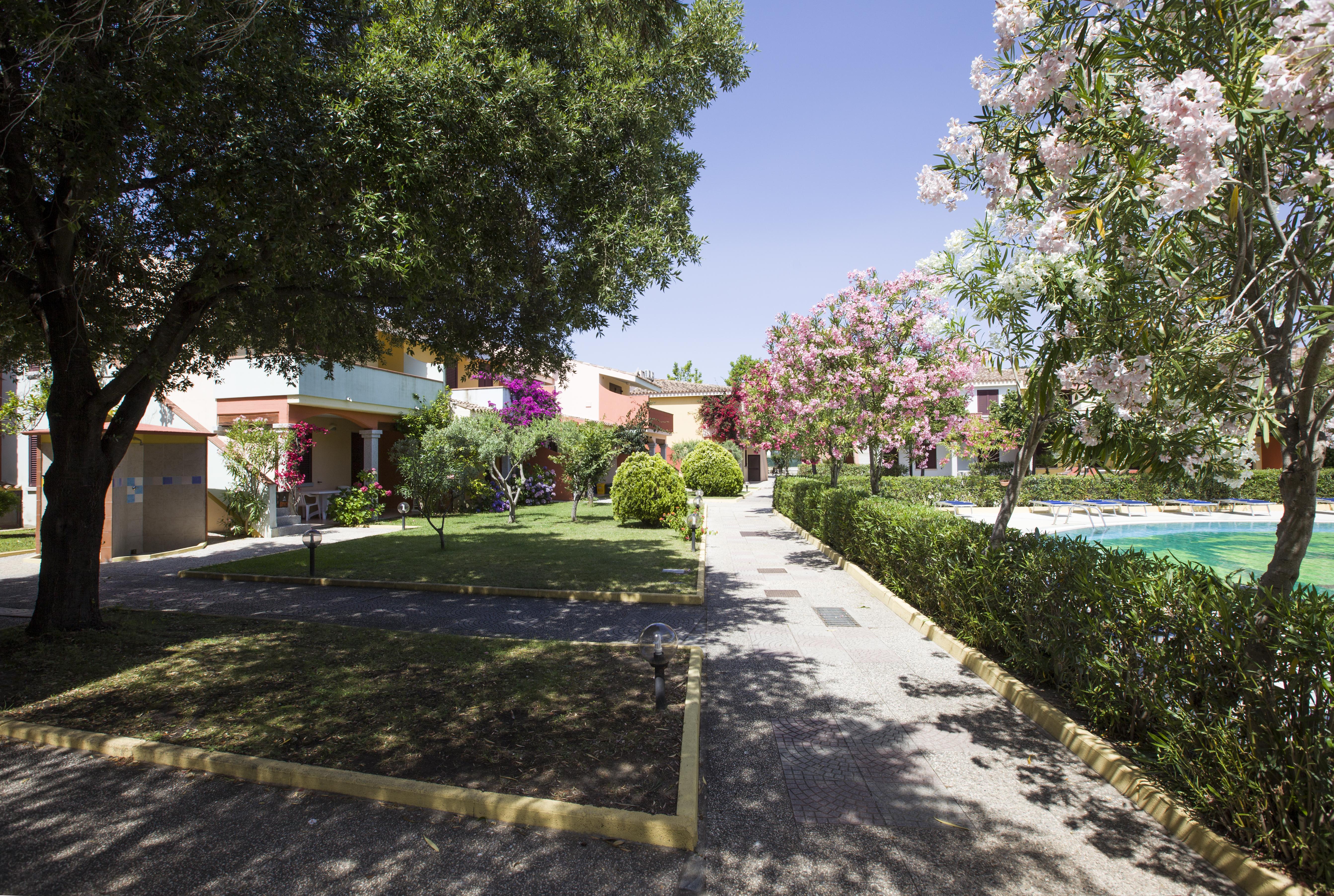 Residence Oasi Anfiteatro Porto Ottiolu Exterior foto